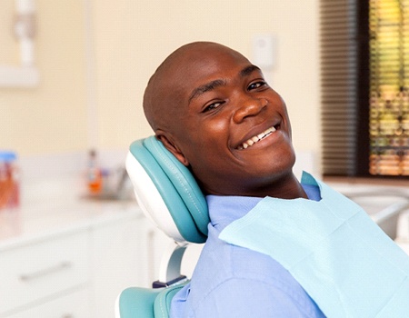 man smiling who needs advanced implant procedures in Azle