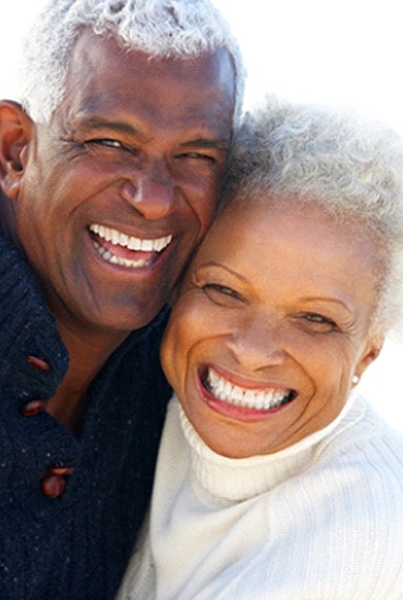 Senior man and woman smiling with All-on-4 in Azle, TX