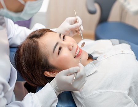 woman beginning process for dental bonding in Azle