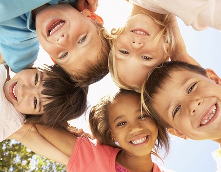  A group of kids smiling together