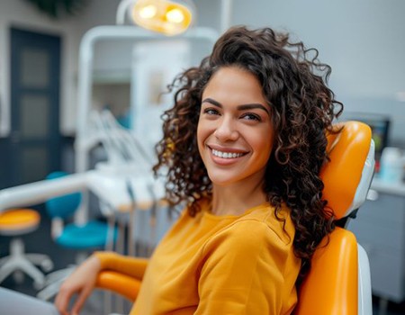 Happy dental team making encouraging gestures