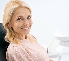 Female dental patient sitting and waiting for treatment