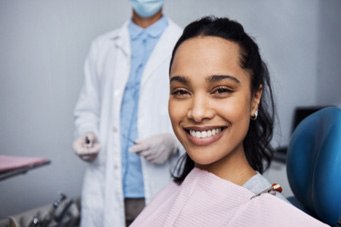 Closeup of woman smiling while sitting in dental chair