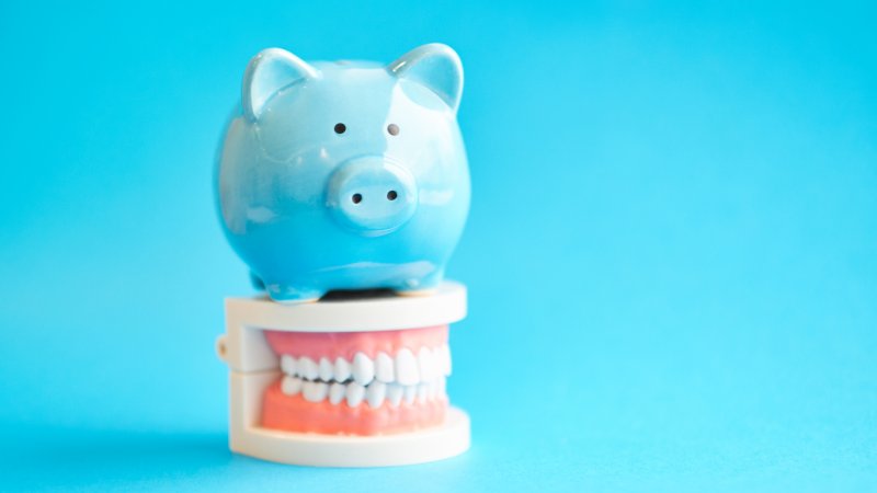 Piggy bank with teeth model.